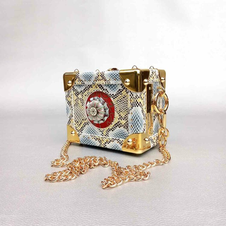 Mallette en cuir de veau façon python de Monsieur Bosson.